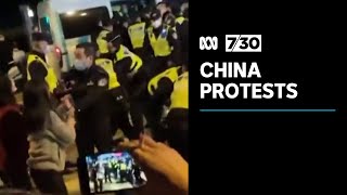 Protests erupt across China over COVID restrictions  730 [upl. by Leveridge734]