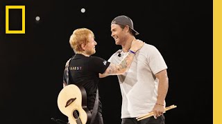 Chris Hemsworth Surprises Fans at Ed Sheeran Concert Playing Drums  Limitless With Chris Hemsworth [upl. by Ahtikal880]