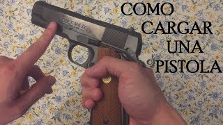 Como cargar una pistola Colt 1911 45 En Español [upl. by Ueihttam]