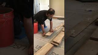 Tile setting WOOD TILE wood tile flooring installation tilesetter [upl. by Durrett587]