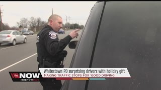 Whitestown police officers hand out cash  not tickets  to drivers [upl. by Drannek869]