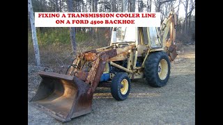 REPLACING A TRANSMISSION OIL COOLER LINE ON A FORD 4500 INDUSTRIAL TRACTOR [upl. by Arremat]