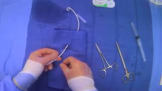 Suturing Tubes In Place HalfHitch Technique [upl. by Heurlin212]