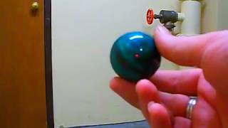 WhamO Superball vs 50¢ Rubber Ball [upl. by Yromem]