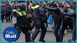 Protests in Europe Police in Amsterdam clash with antilockdown protesters [upl. by Pooley]