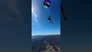 Skydiver deploys her parachute in slow motion [upl. by Ahtanamas]