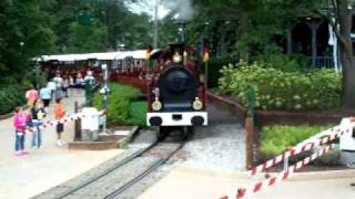 Red train departing tweedside station Busch Gardens Williamsburg Va [upl. by Hills]