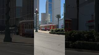 A streetcar rolls down Canal St in French Quarter in New Orleans neworleans streetcar trolley [upl. by Aynatahs]