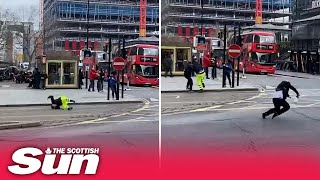 STORM EUNICE People blown over in London as galeforce winds hit [upl. by Osrick]