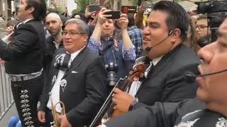 Mariachi band plays at protest of lawyer in racist rant video [upl. by Pollock]