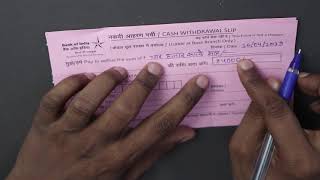 Bank se paise nikalne ka form kaise bhare  how to fill withdrawal slip in hindi [upl. by Jenn301]