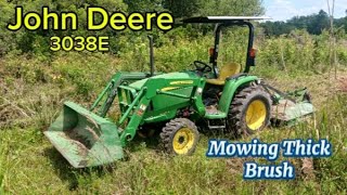 MOWING Thick brush with the JOHN DEERE 3038e [upl. by Sorcha184]