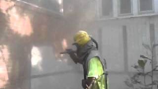 Sandblasting a brick wall of a house being redone [upl. by Hooge]