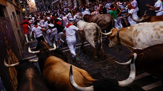 Running of the bulls takes place at Spanish festival [upl. by Martreb332]