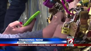 Officials removing quotlove locksquot from Pont des Arts Bridge [upl. by Salomo12]