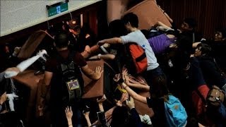 Taiwan students protest China trade pact in parliament [upl. by Nerrat127]