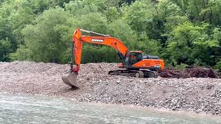 DOOSAN DX350LC and VOLVO L90F doing river maintenance  Pulfero Italy [upl. by Notsur12]