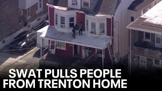 Trenton hostage situation People pulled from windows by SWAT team [upl. by Ggerc814]