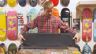 How To Grip Tape A Skateboard Deck PERFECTLY Slam City Skates [upl. by Ru]