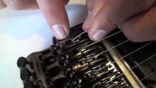 Restringing a guitar with a locking tremolo Floyd Rose [upl. by Bigner]