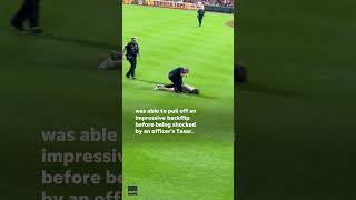 Security uses Taser on backflipping field intruding fan Shorts [upl. by Snehpets625]