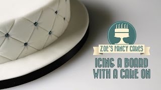 Icing a board with a cake on How To Tutorial Zoes Fancy Cakes [upl. by Yesnek549]