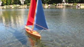 RC sailboat two masted flat bottom sharpie sailing on Christian Science Boston pool [upl. by Oisacin]