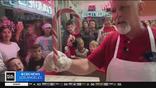 Logans Candies crew treats the masses to holiday magic in the form of handmade candy canes [upl. by Asilenna566]