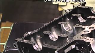 Sealing Engine Blocks  Kawasaki Robotics Japanese [upl. by Kooima]