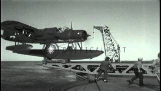 American float plane OS2U catapulted from battleship and bombardment at San FernaHD Stock Footage [upl. by Melia]