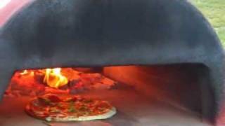 Rauls WoodFired Pizza Oven in Action  3 Minute Pizza [upl. by Acirre616]