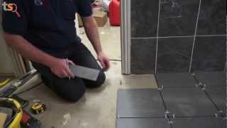 Tommys Trade Secrets  How To Tile A Floor [upl. by Ahcmis]