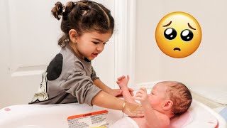 Toddler Gives Newborn Baby His First Bath adorable [upl. by Lorre714]