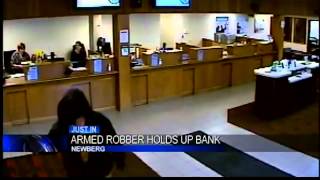 Bank robber escapes on bike in Newberg [upl. by Clarinda]