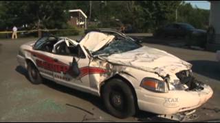 Man Angry Over Arrest Crushes Police Cars [upl. by Atteselrahc]