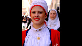 Sardinian Women dressing traditional costumes HD [upl. by Nauqyt]