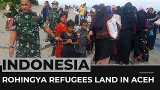 Boats with over 200 Rohingya refugees land in Indonesias Aceh [upl. by Etom607]