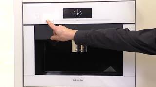 How to rinse the milk pipework on your Miele builtin coffee machine [upl. by Nnylyaj264]