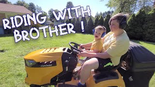 Two brothers mow the lawn on a riding mower KIDS AND LAWNMOWERS  Lawnmower Boy 19 [upl. by Iana]