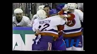 NHL Dec 5 1991 Mick VukotaNYI v Mario RobergeMTL New York Islanders Montreal Canadiens [upl. by Cailly627]