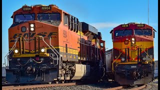 BNSF rolls by a Stopped CPKC Train on the Tower 26 Curve [upl. by Nilauqcaj]