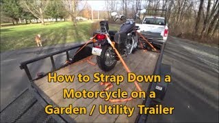 How to Strap Down a Motorcycle on a Garden or Utility Trailer [upl. by Ahsinnek]