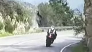 Motorcycle flips over cliff in scary crash caught on tape [upl. by Jasun]