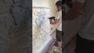 painting granite fire place Graco Ultra [upl. by Osanna228]