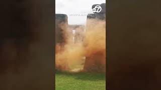 Climate activists spray Stonehenge with orange powder [upl. by Hoisch]