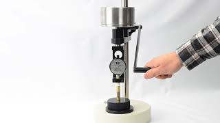 RX1600C with OS1 Durometer test stand measuring hockey puck hardness [upl. by Verlee255]