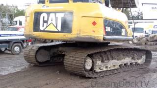 CATERPILLAR 324D EXCAVATOR LOADING DUMP TRUCKS WITH DIRT [upl. by Anital814]