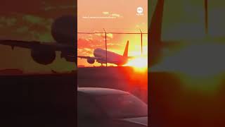 Plane makes dramatic landing at Toronto airport amid strong crosswinds [upl. by Riki542]