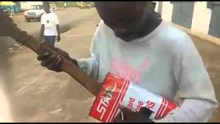 Blind Liberian Man Sings Reggae With Stick and Oil Can Guitar [upl. by Yraek]