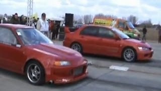 Honda Civic Red Rocket Turbo Vs Mitsubishi Lancer Evo IX Drag Race [upl. by Anialram798]